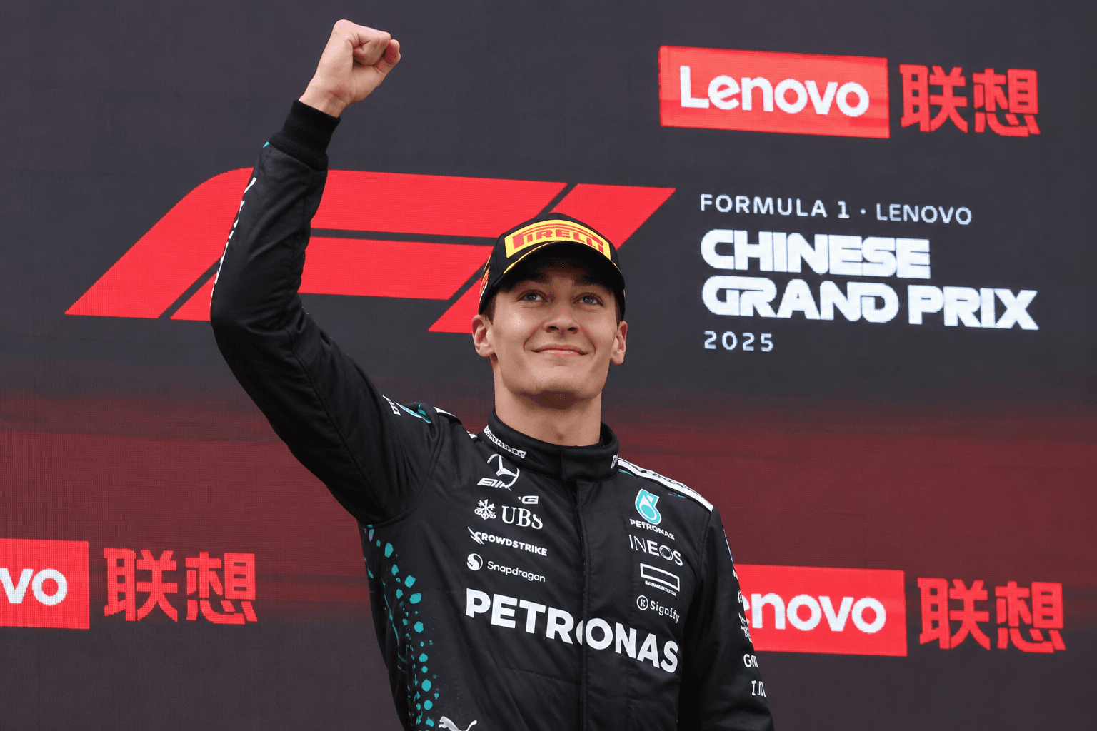 Russell Holds Off Ferrari in China
